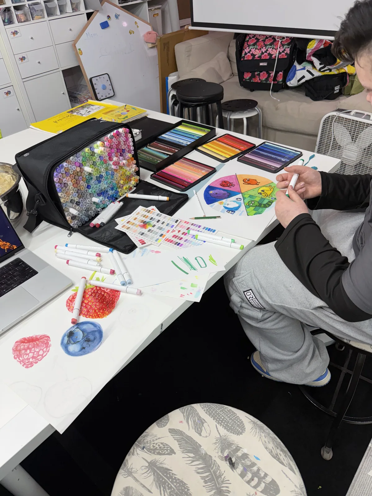 An artist choosing colors for a personal character study